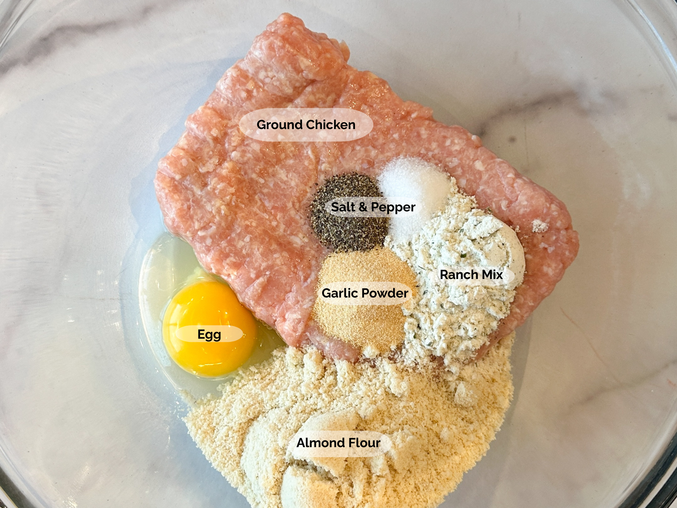 Buffalo Chicken Meatballs ingredients: lean ground chicken, egg, almond flour, garlic powder, salt and pepper, and ranch mix