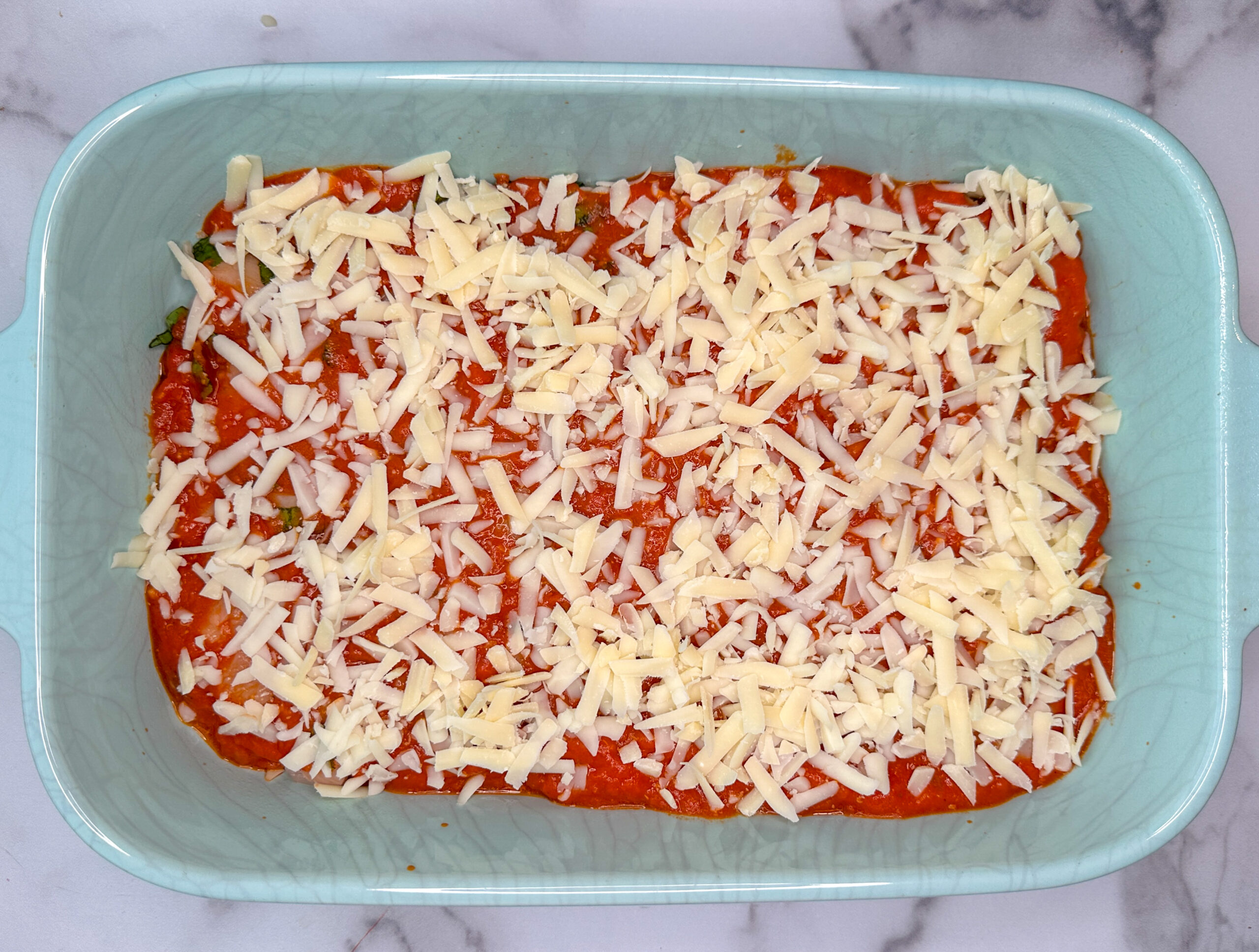 Diced chicken breast topped with garlic, basil, and shredded mozzarella cheese.