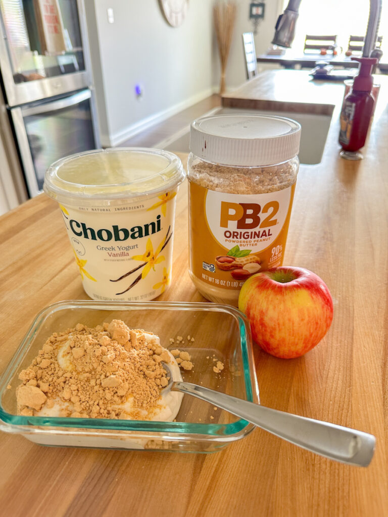 Vanilla Greek yogurt, powdered peanut butter, and a Honeycrisp apple