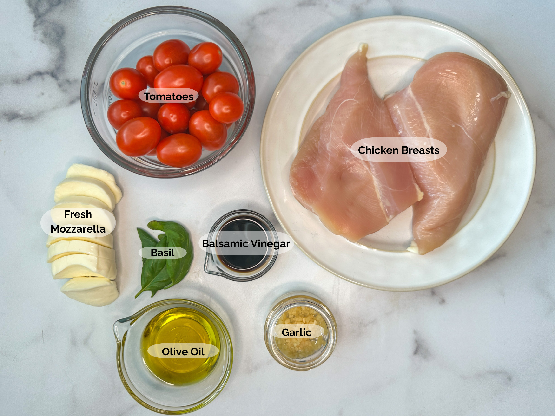 One Pan Chicken Caprese ingredients: chicken breasts, tomatoes, fresh mozzarella, basil, balsamic vinegar, garlic, olive oil