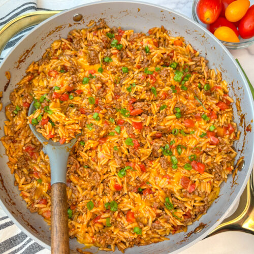 cheeseburger orzo skillet pasta dish in a large skillet