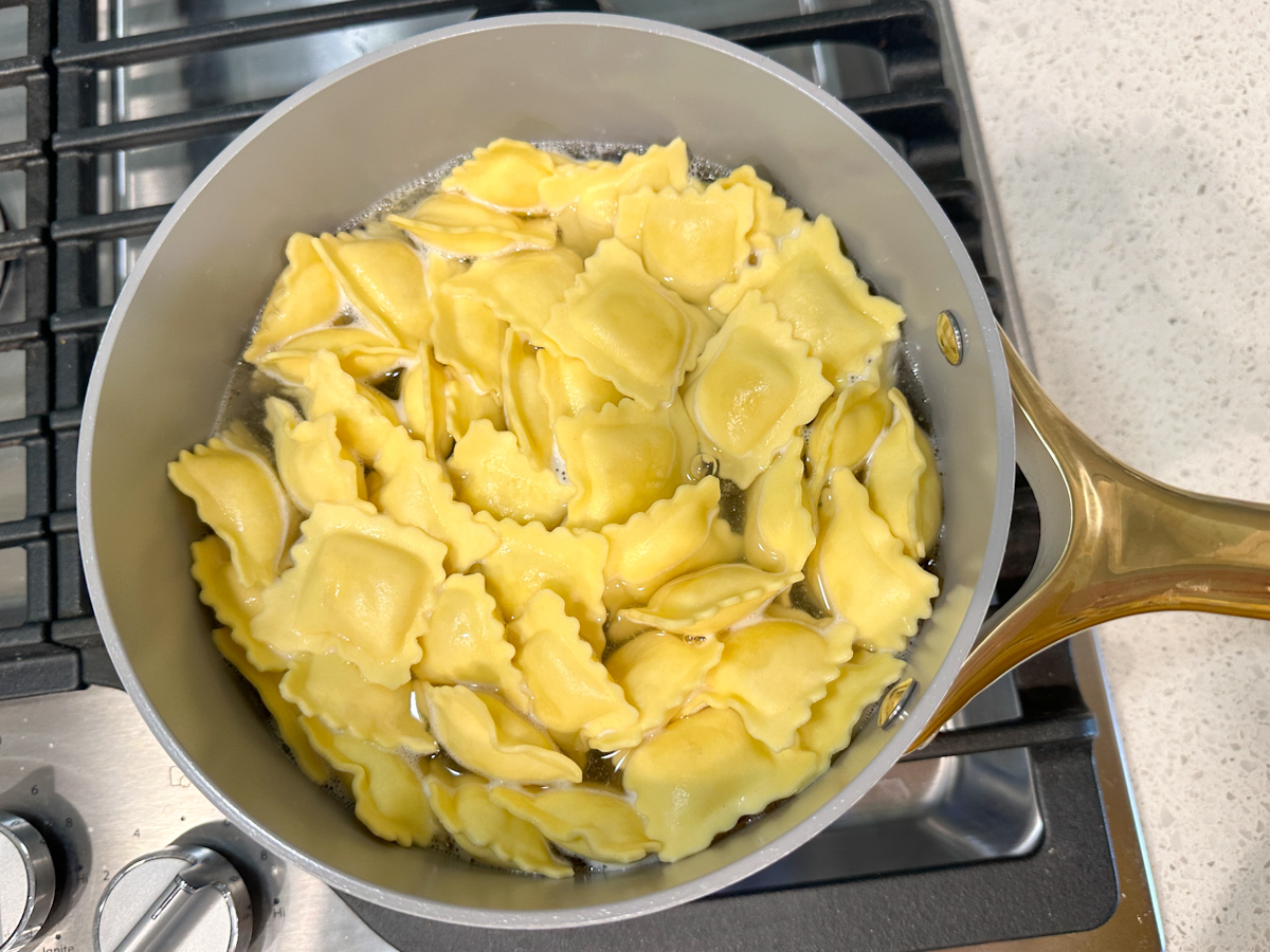 cheese ravioli in a pot cooking