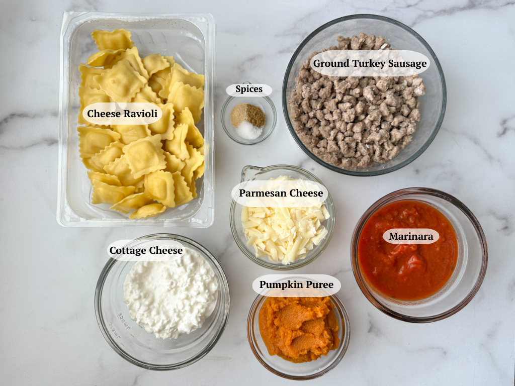 Creamy pumpkin ravioli ingredients: refrigerated cheese ravioli, ground turkey sausage, spices, marinara, shredded parmesan, cottage cheese, pumpkin puree