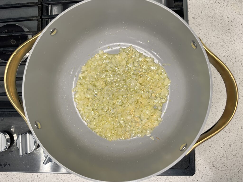 Olive oil with translucent sauteed onions and minced garlic.