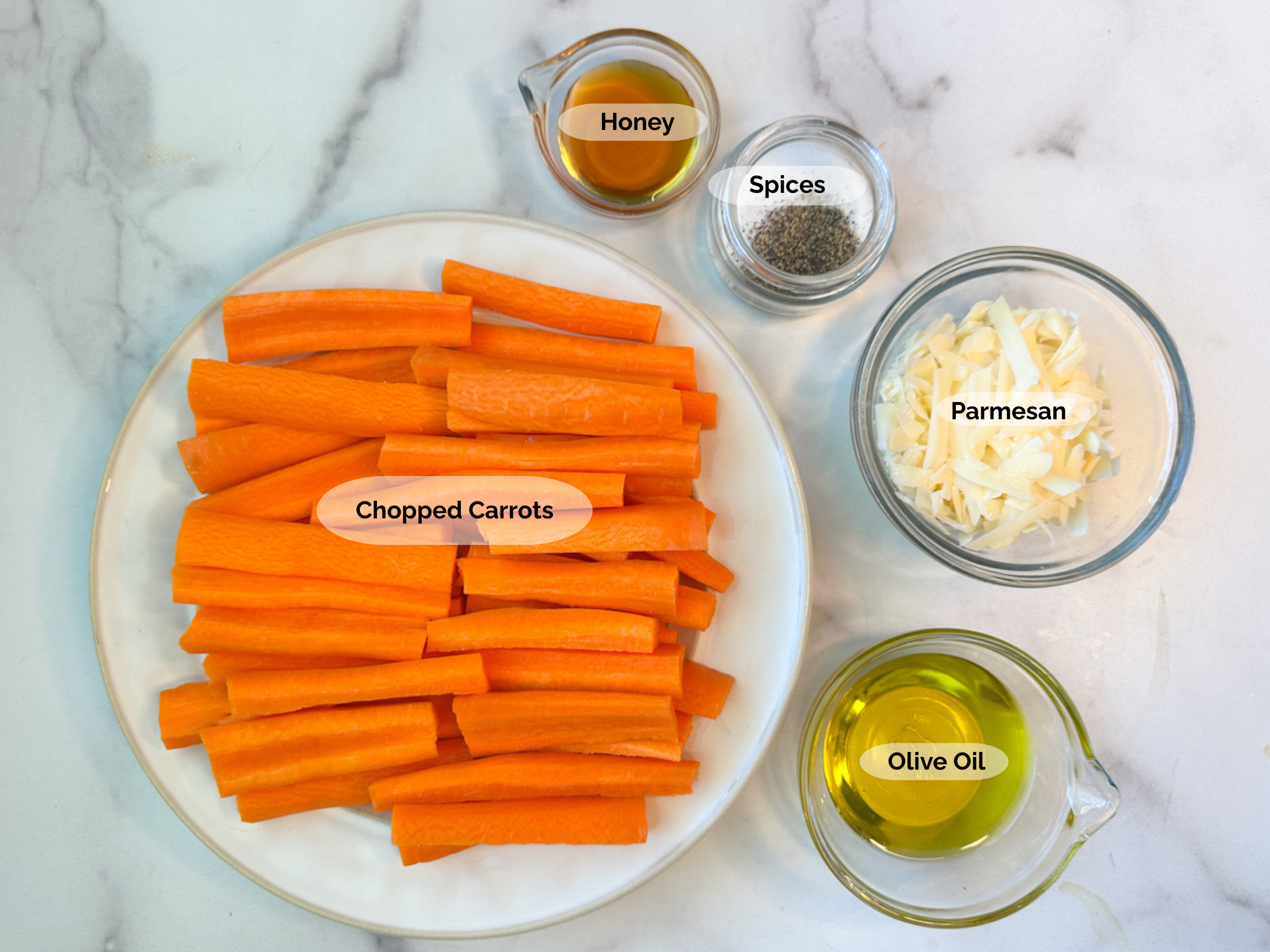Parmesan Roasted Carrots Ingredients: Cut carrots, honey, spices, parmesan, and olive oil