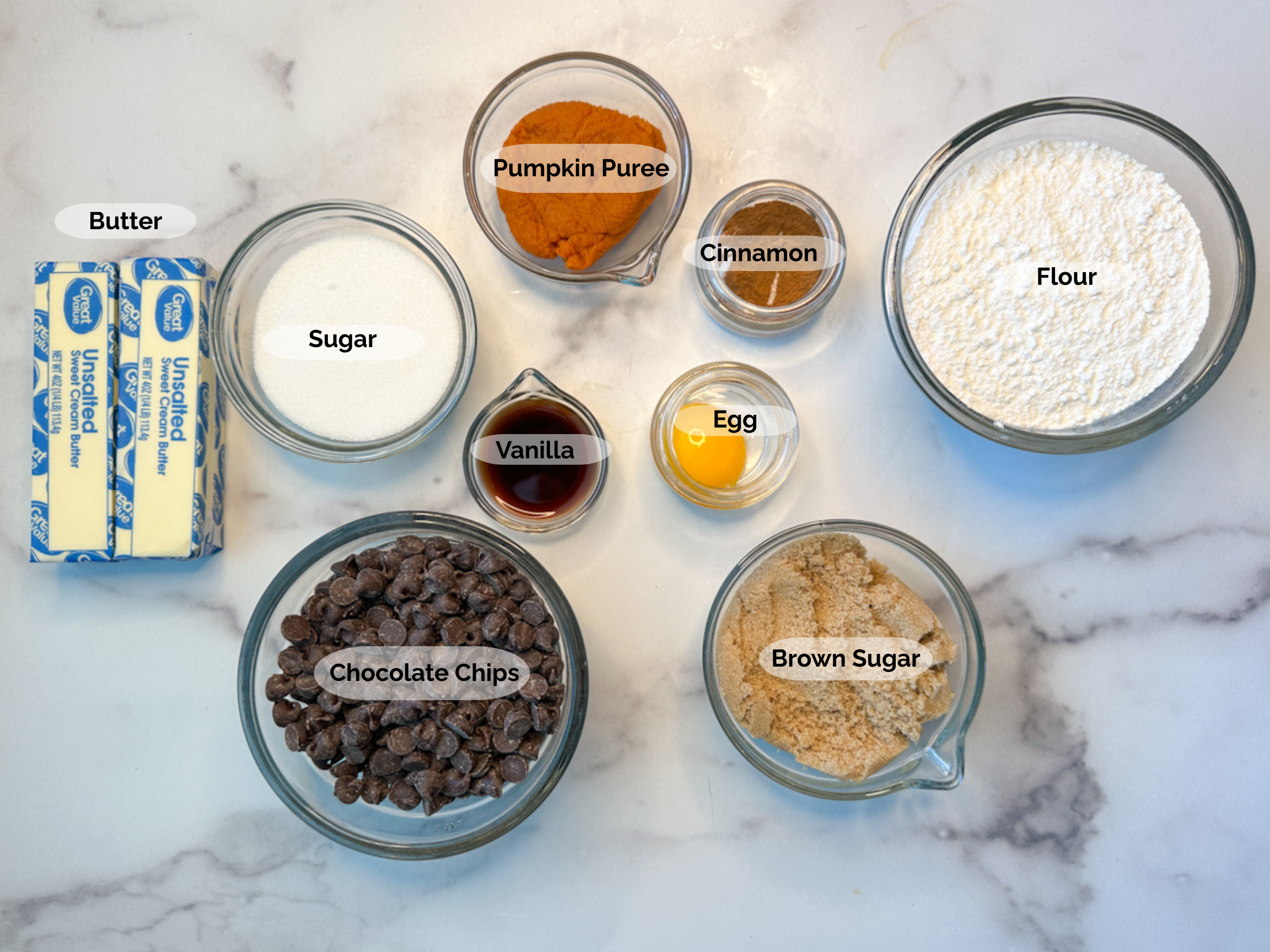 Brown butter pumpkin chocolate chip cookie ingredients: 2 butter sticks, sugar, pumpkin puree, cinnamon, vanilla, egg, flour, brown sugar, chocolate chips.