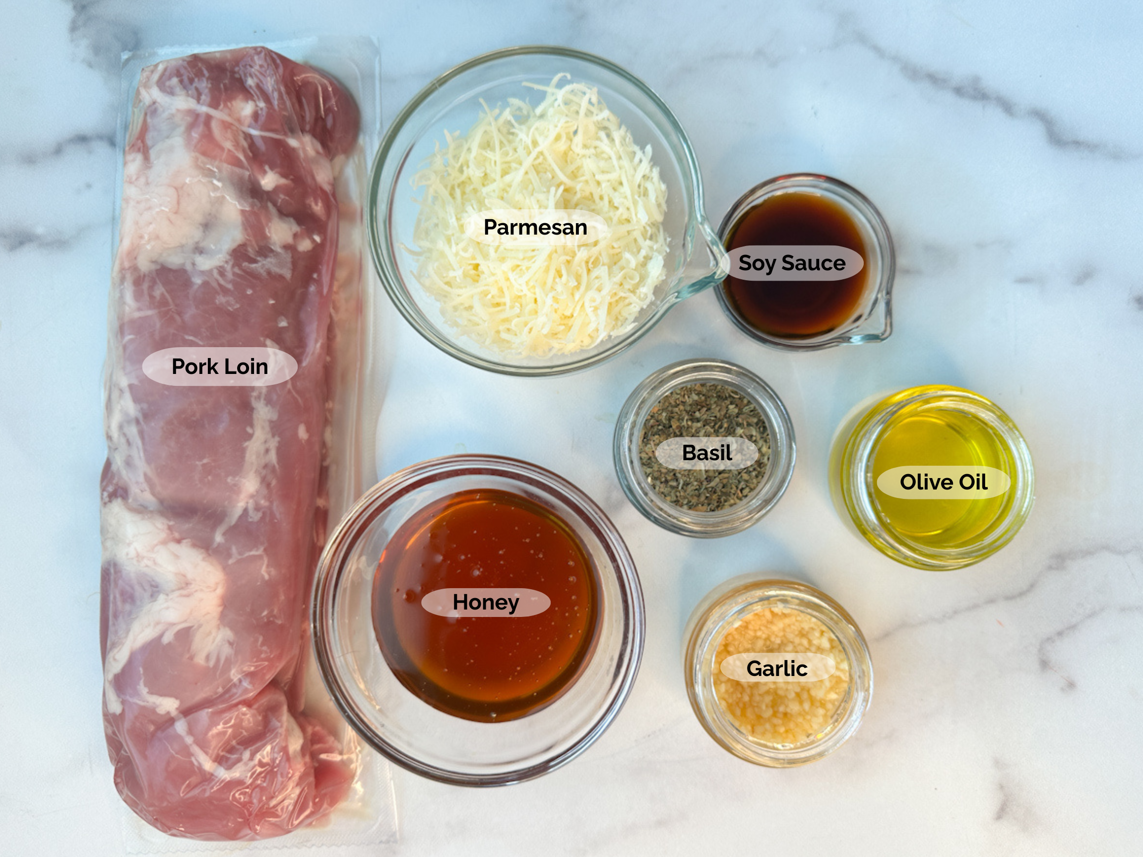 Parmesan Pork Loin Ingredients: pork loin, shredded parmesan, soy sauce, dried basil, olive oil, garlic, and honey