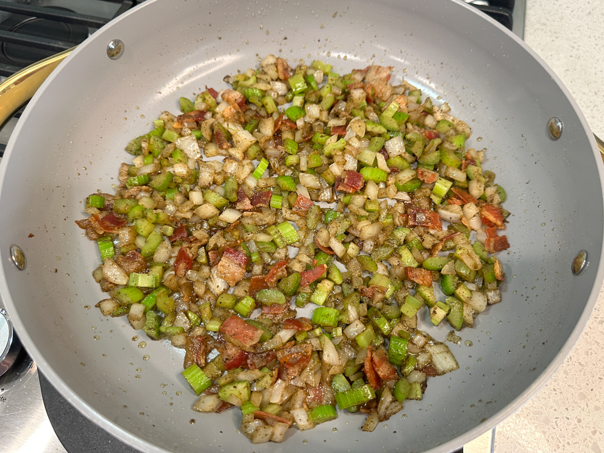 sauteed celery, onion, and bacon bits in a large skillet.