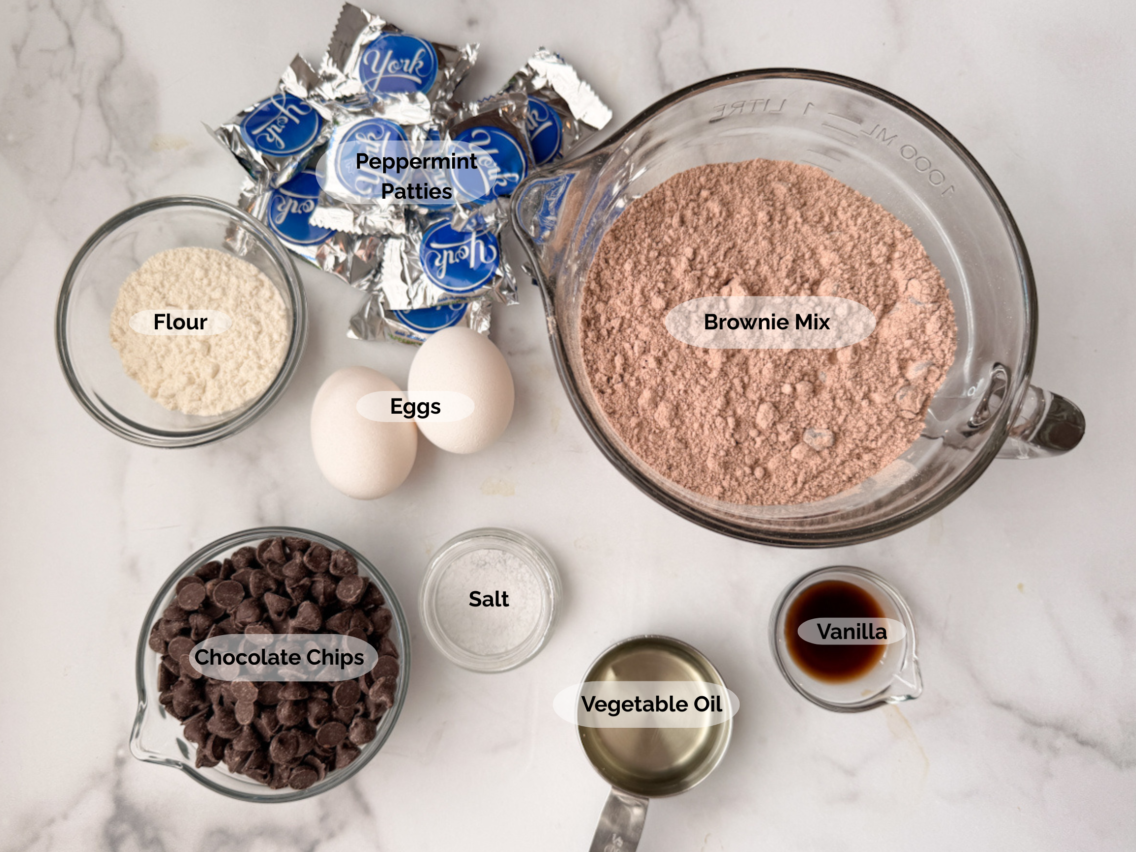 Fudgy Peppermint Brownie Cookies ingredients: brownie mix, vanilla, vegetable oil, salt, chocolate chips, eggs, flour, peppermint patties