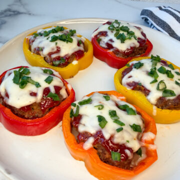5 individual rings of bell pepper meatloaf on a plate