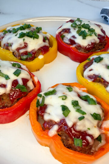 5 individual rings of bell pepper meatloaf on a plate