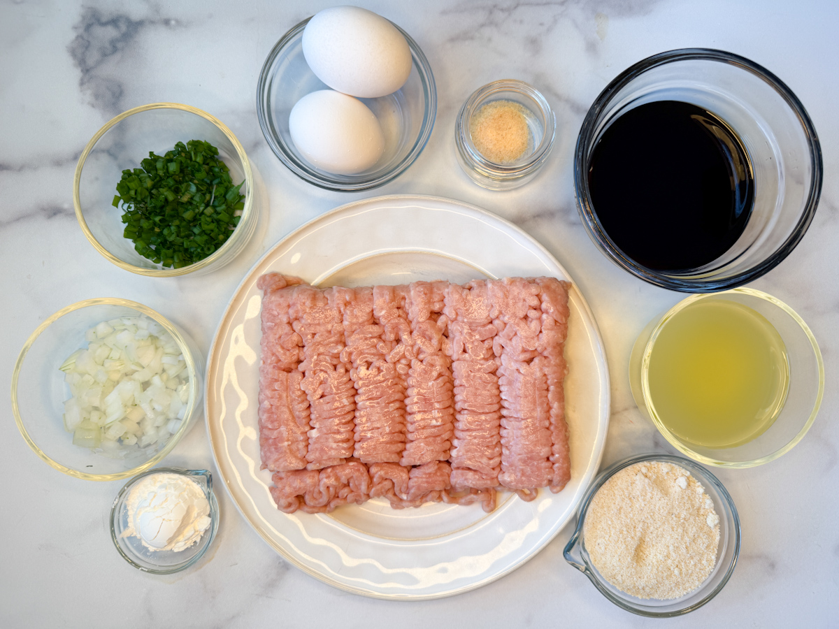 Teriyaki Chicken Meatballs ingredients: ground chicken, teriyaki sauce, egg, garlic powder, green onion, yellow onion, pineapple juice, cornstarch, almond flour.