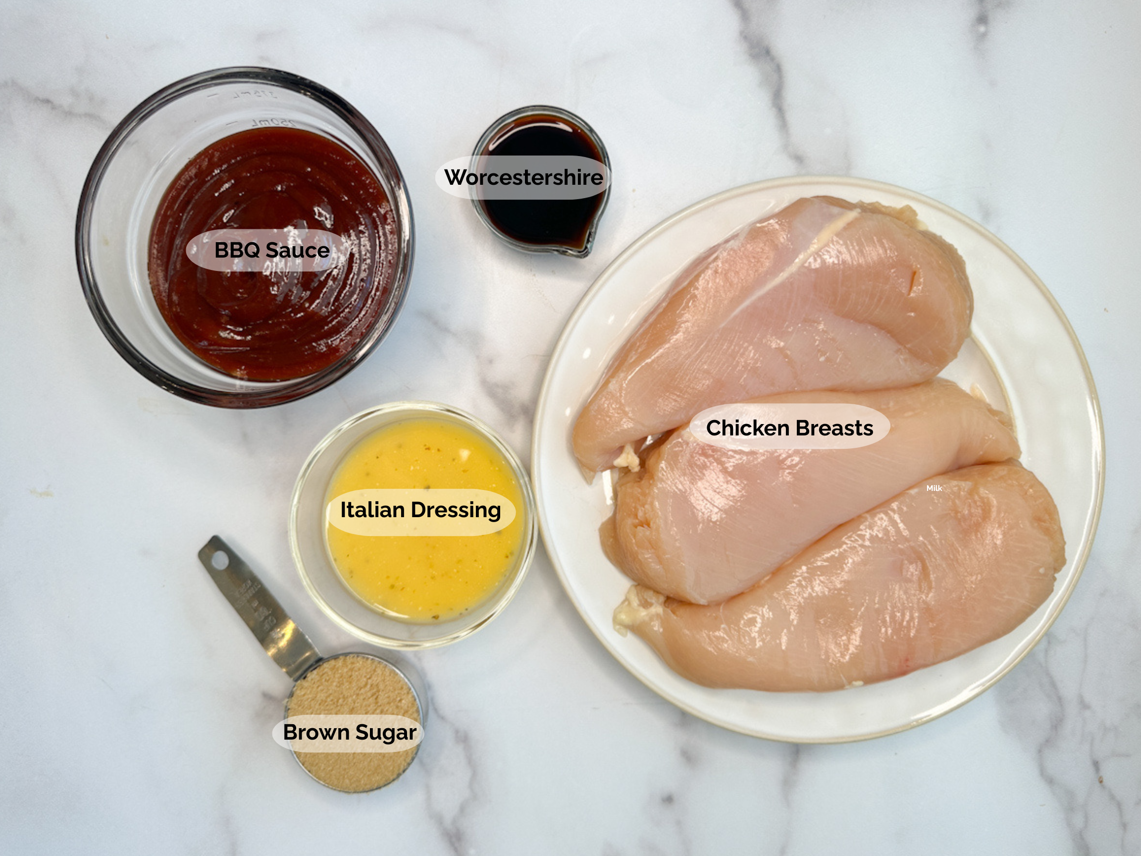 Slow Cooker Zesty BBQ Chicken ingredients: bbq sauce, worcestershire, chicken breasts, italian dressing, and brown sugar