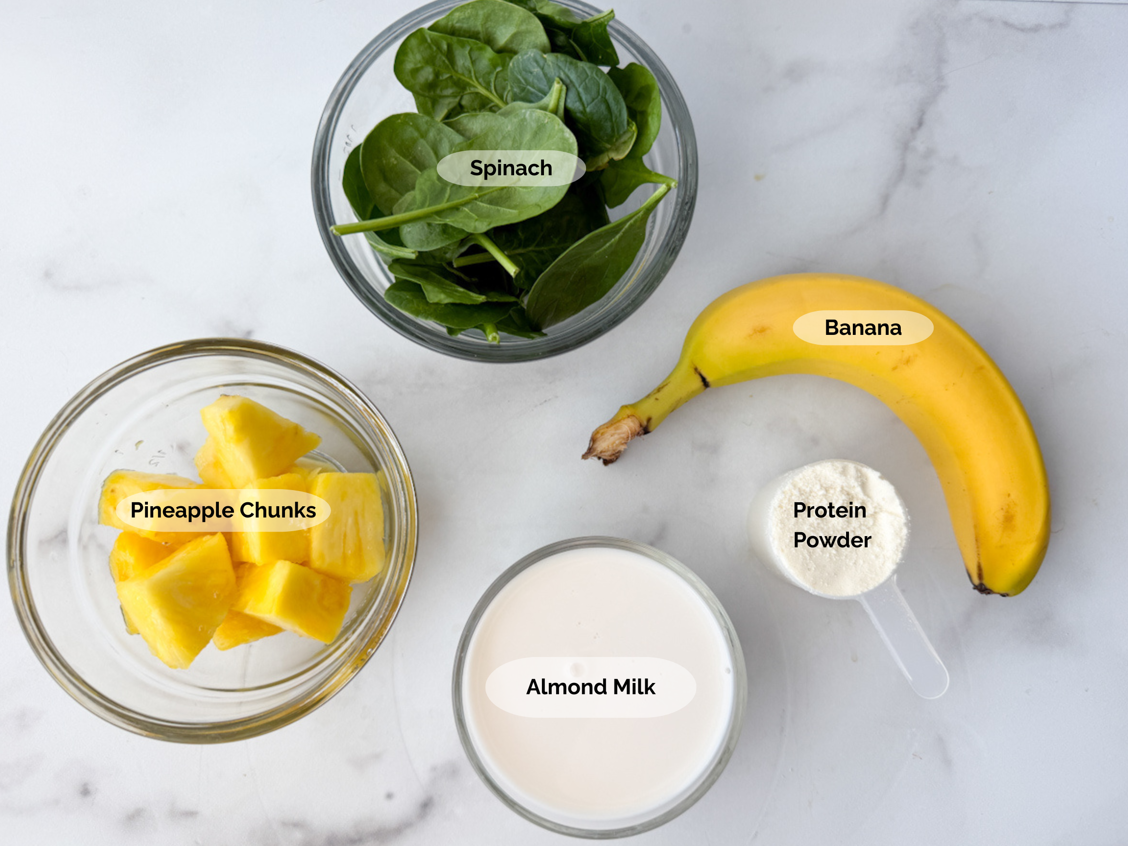 Pineapple Spinach Smoothie Ingredients: pineapple chunks, baby spinach, small banana, almond milk, and protein powder